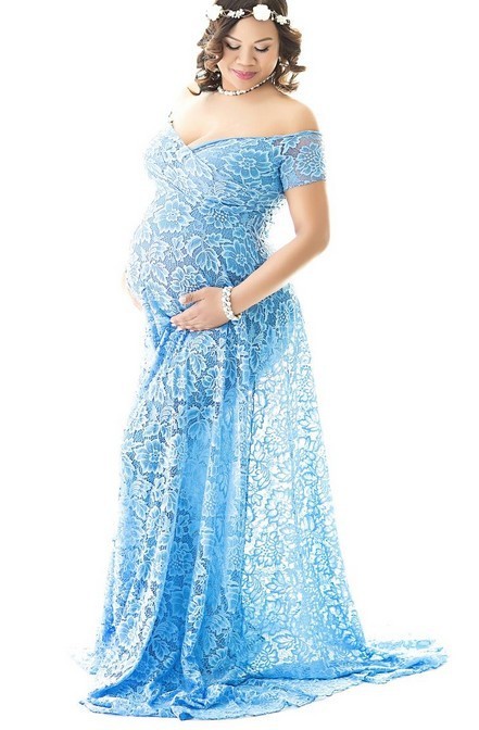 Maternity long tail lace dress in blue, short-sleeved, accentuates baby bump, perfect for photoshoots and special occasions.