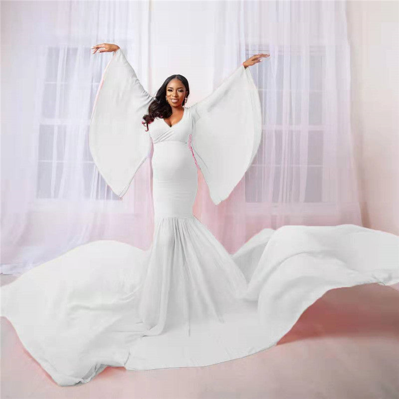 Maternity Long Flowing DressCapture the beauty of pregnancy with this stylish solid color maternity photo trailer dress. Designed to flow gracefully, it creates the perfect silhouette for mater0Maternity LongMaternity Luv