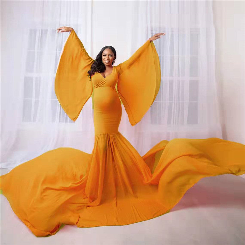 Maternity Long Flowing DressCapture the beauty of pregnancy with this stylish solid color maternity photo trailer dress. Designed to flow gracefully, it creates the perfect silhouette for mater0Maternity LongMaternity Luv