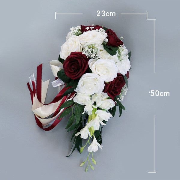 Waterfall white flowers bouquet with burgundy accents, measuring 23cm by 50cm, perfect for maternity occasions.